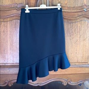 Scuba fabric, asymmetric skirt; perfect condition